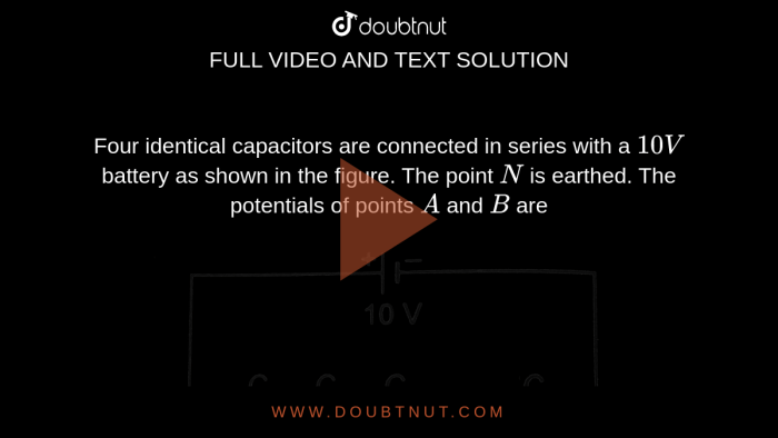 Four identical capacitors are connected